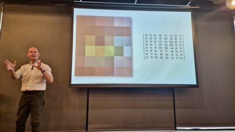 AI Innovisory workshop session with engaged participants learning AI strategies